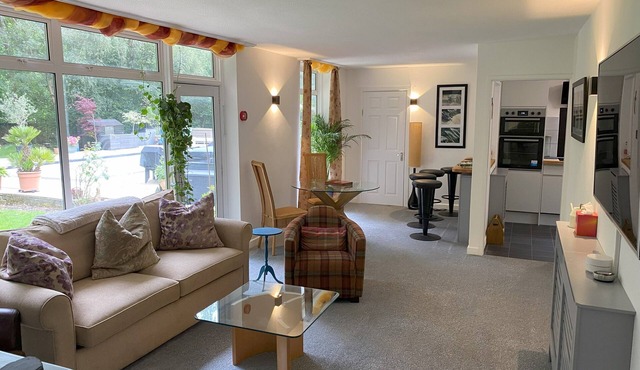 Relax surrounded by woodland in the Annex at Capers End!