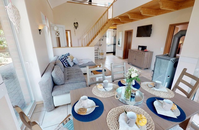 Spacious 8-person vacation home with sauna, fireplace and garden near the beach