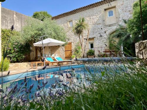 Saint-Genies-de-Malgoires House | La Maison Des Autres, piscine chauffée, chambres d'hôtes proches Uzès, Nîmes, Pont du Gard, Table d'hôtes d'octobre à fin avril sur réservation