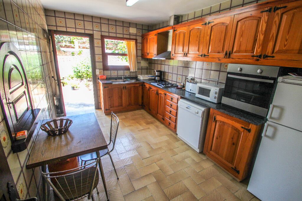 Photo of Kitchen in Urbanitzacio la Fustera