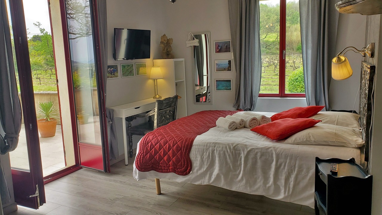 Photo of Bedroom in Saint-Julien-de-Peyrolas