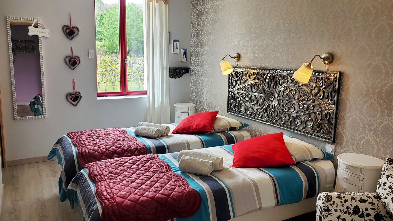 Photo of Bedroom in Saint-Julien-de-Peyrolas