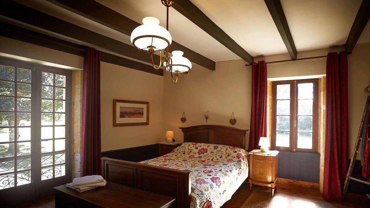 Photo of Bedroom in Saint-Cernin-de-Labarde
