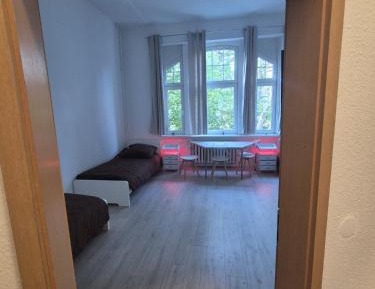 Single Bed in Dormitory Room