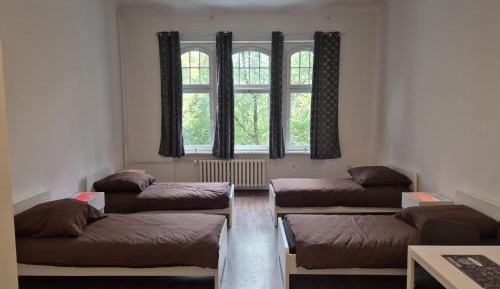 Single Bed in Dormitory Room