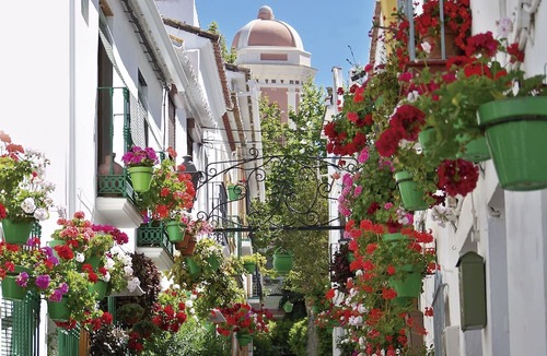 Casares Apartment | Family-friendly Villa-Style 3 Bedroom Apt with Putting Green & Private Garden.